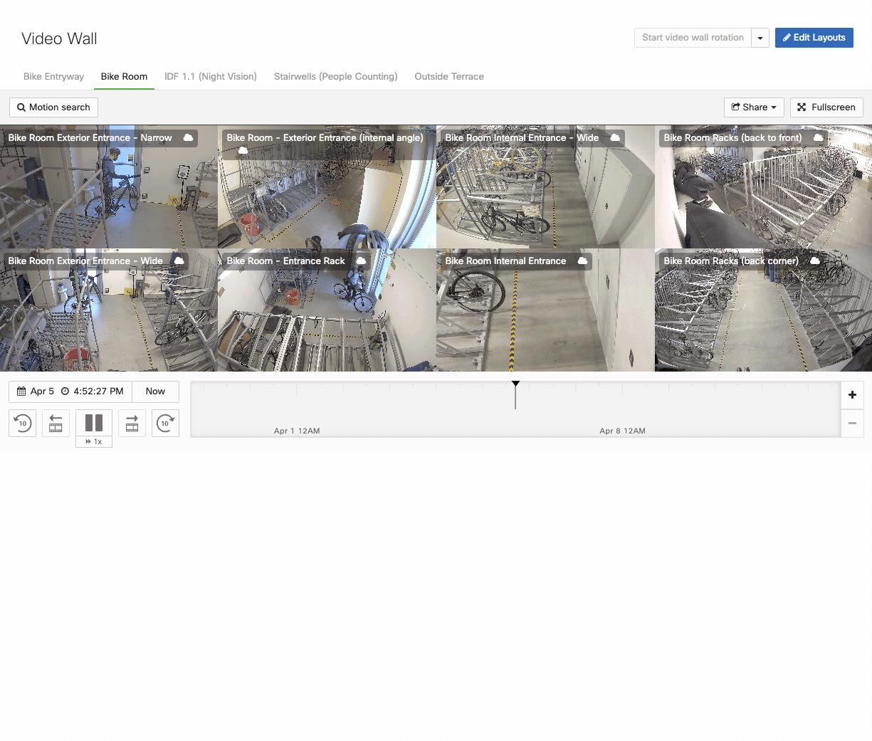 The gif is displayed to show the biker inside the bike room in one video wall layout and leaving the bike room in another.